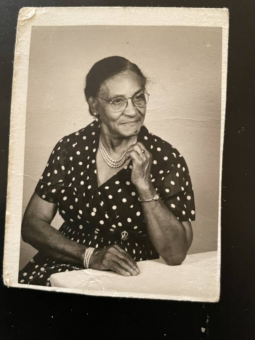 Vintage black-and-white portrait of a Bennett elder in a polka-dot dress